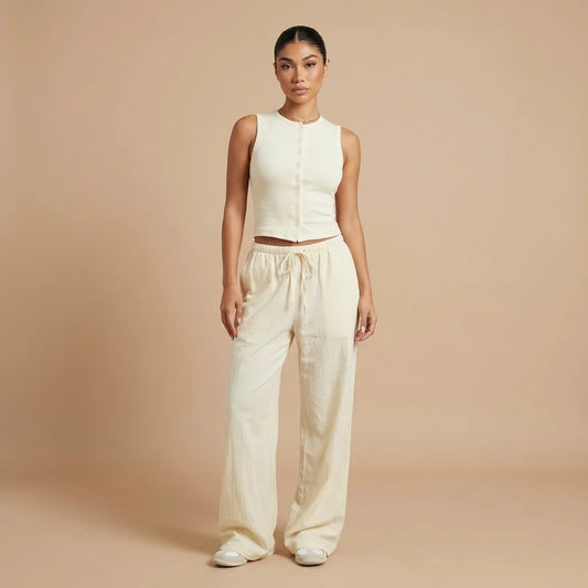 Woman wearing the Lunelle Cotton Lounge Set in Butter Cream, front studio view