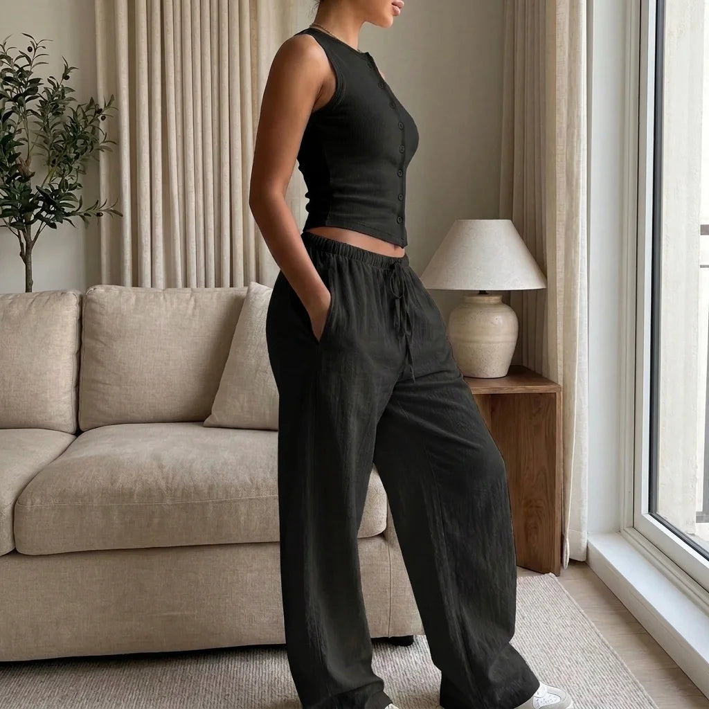 Side view of the Classic Black Lunelle set showing pockets and wide-leg pants