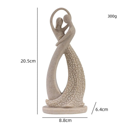 Beige abstract couple sculpture with a diagram showing 20.5 cm height, 8.8 cm width and 6.4 cm depth