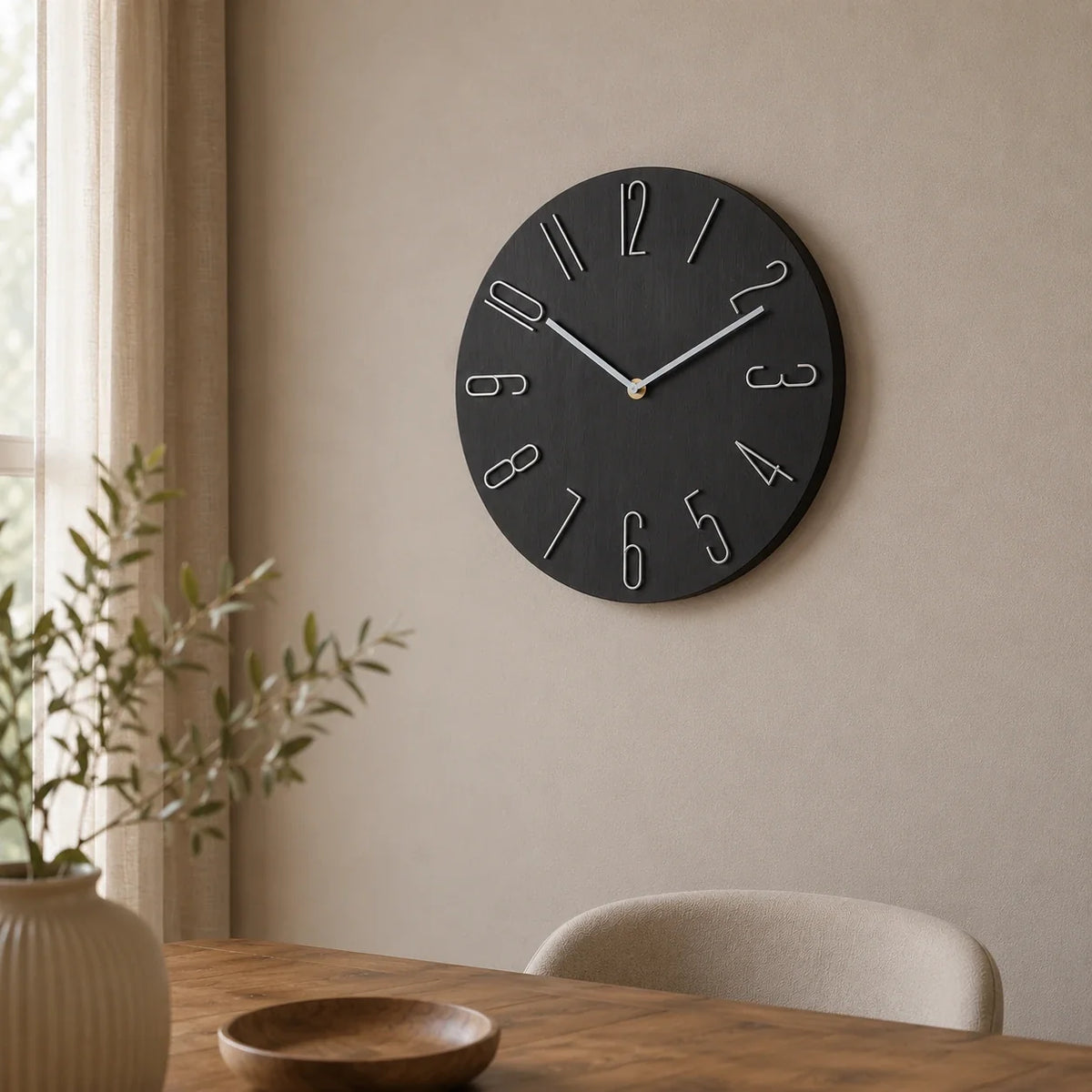 Bellagio Black 30cm black wall clock, on a dining room wall