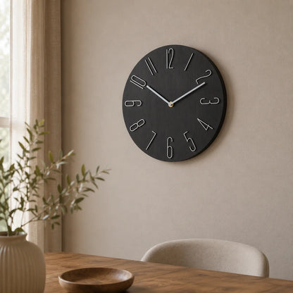 Bellagio Black 30cm black wall clock, on a dining room wall