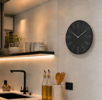 Bellagio Black 30cm black wall clock, in a kitchen