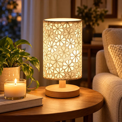 Decorative floral table lamp styled in a warm reading corner