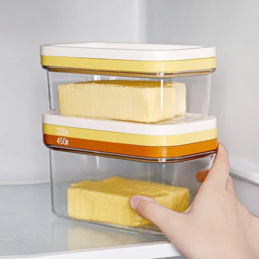 Butter dish with integrated stainless steel slicer