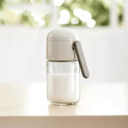Glass salt and seasoning dispenser with integrated measure – view 2