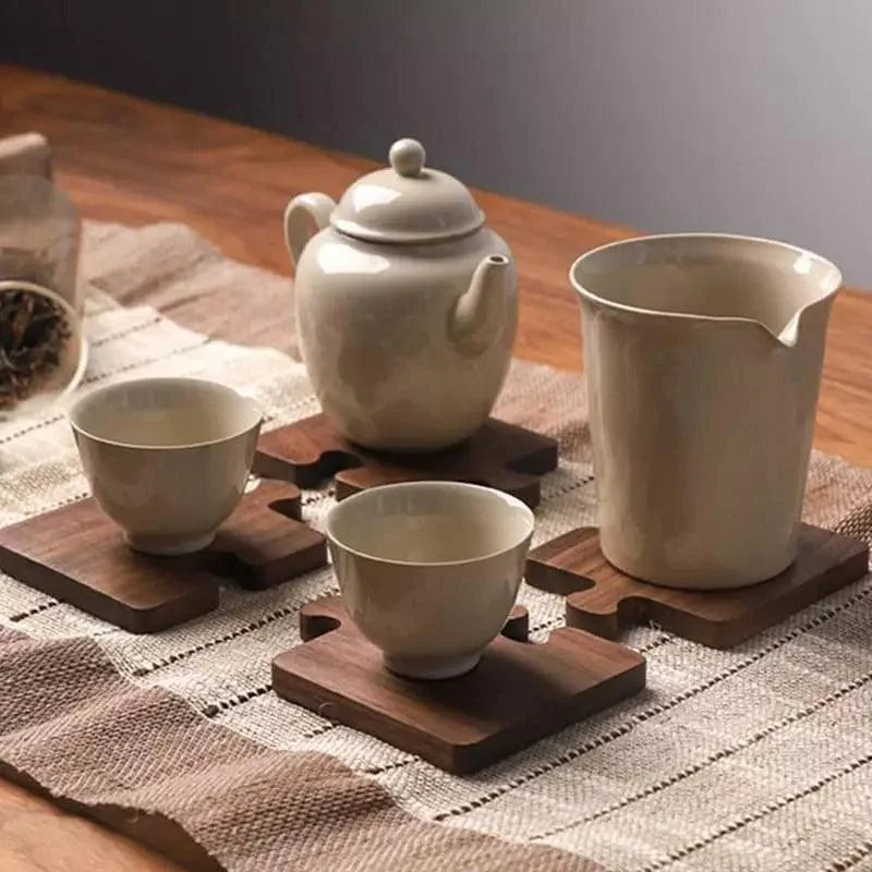 Walnut wood trivet and coaster set