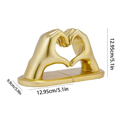 Gold-coloured heart-hand bookends placed together, with a diagram marking 12.95 cm height