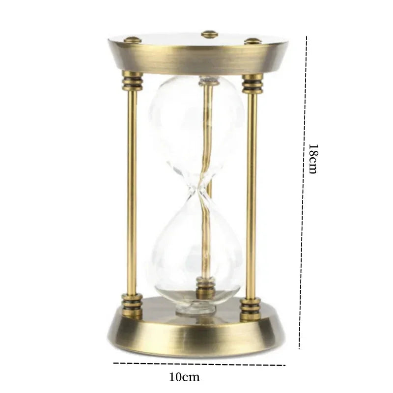 Gold metal hourglass dimension diagram labelled 18 cm high and 10 cm across the base.