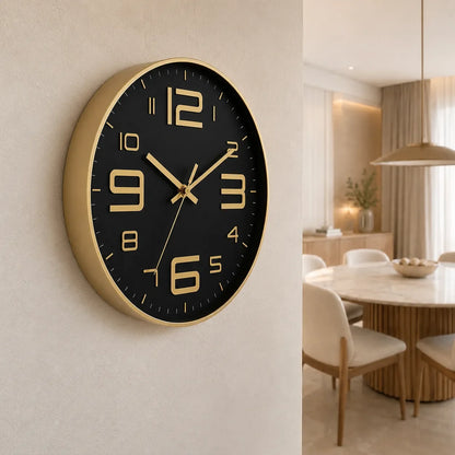Aurelio Gold & Black 30cm gold wall clock, on a dining room wall