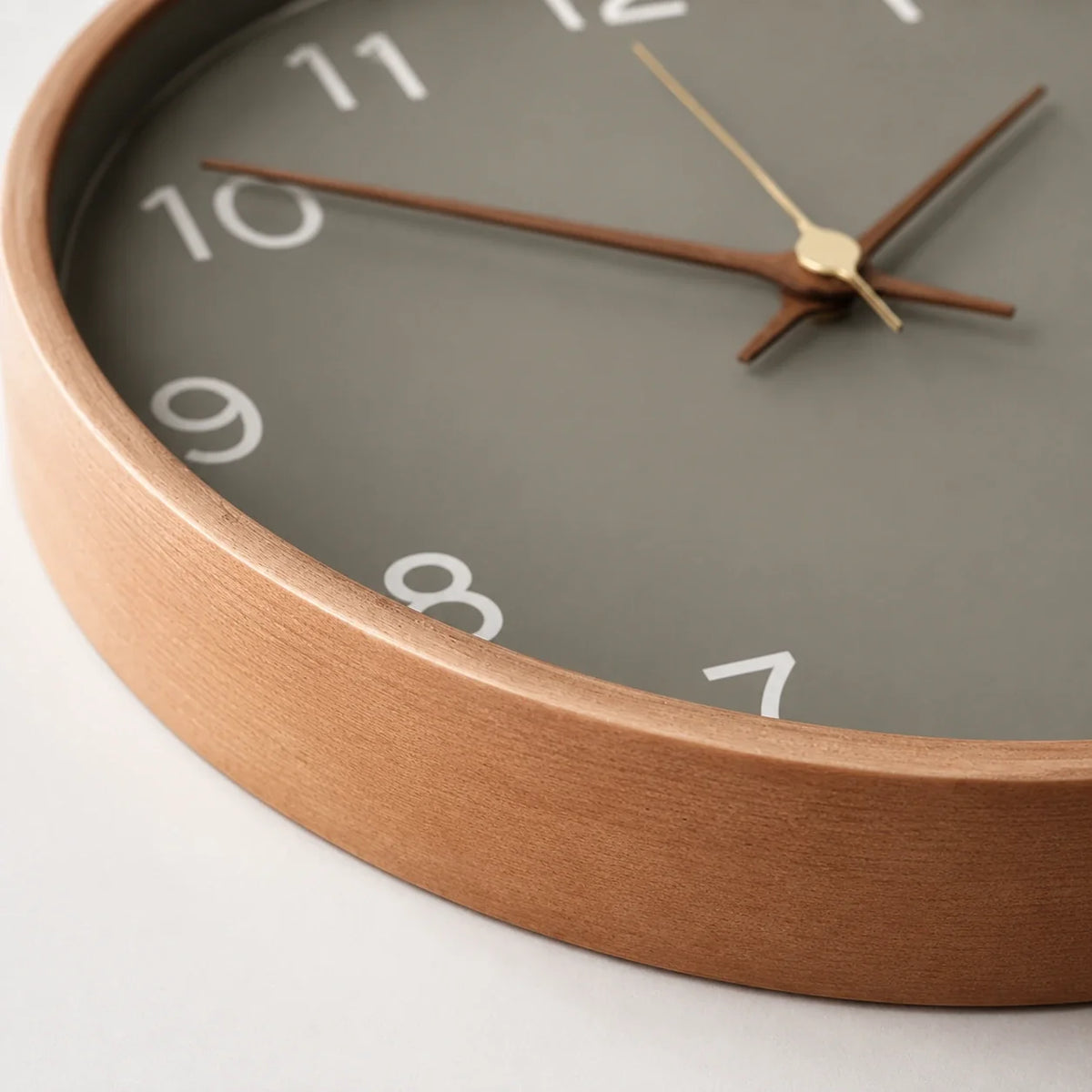 Milano Gray 25cm grey wall clock, close-up of the dial and frame