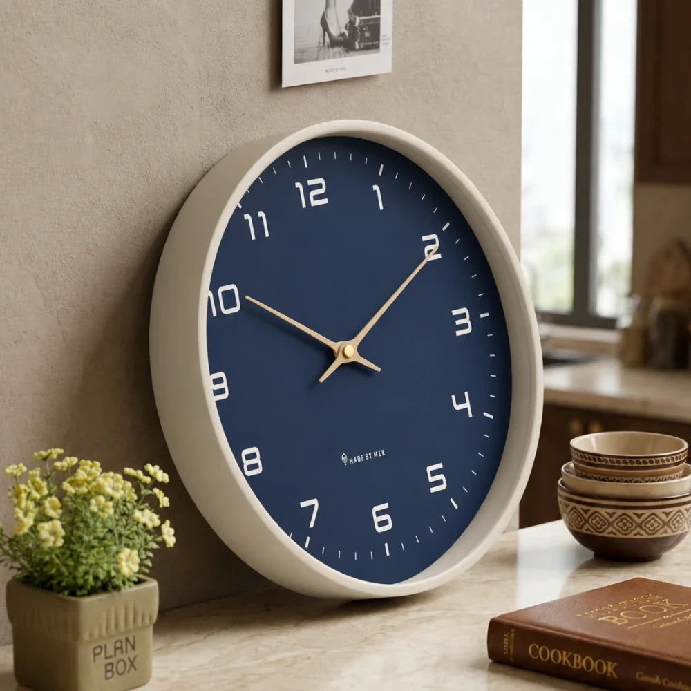 Lorenzzo Blue Night 25cm modern wall clock, angled view on the wall