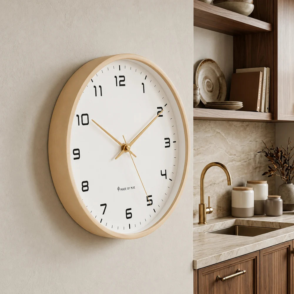 Lorenzzo White & Gold 25cm modern wall clock, angled view on the wall
