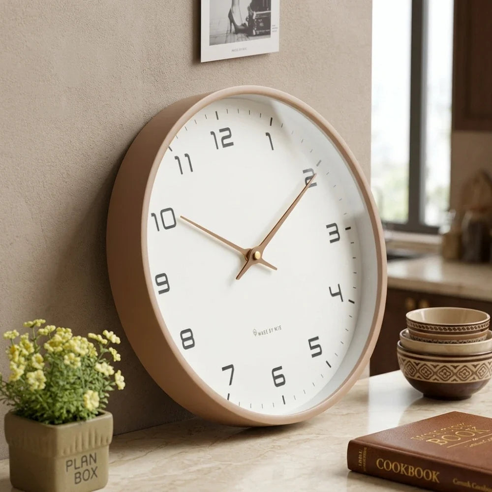 Lorenzzo Wood 25cm modern wall clock, angled view on the wall