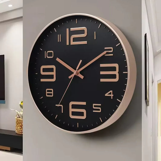 Aurelio Rose & Black 30cm pink wall clock, angled view on the wall