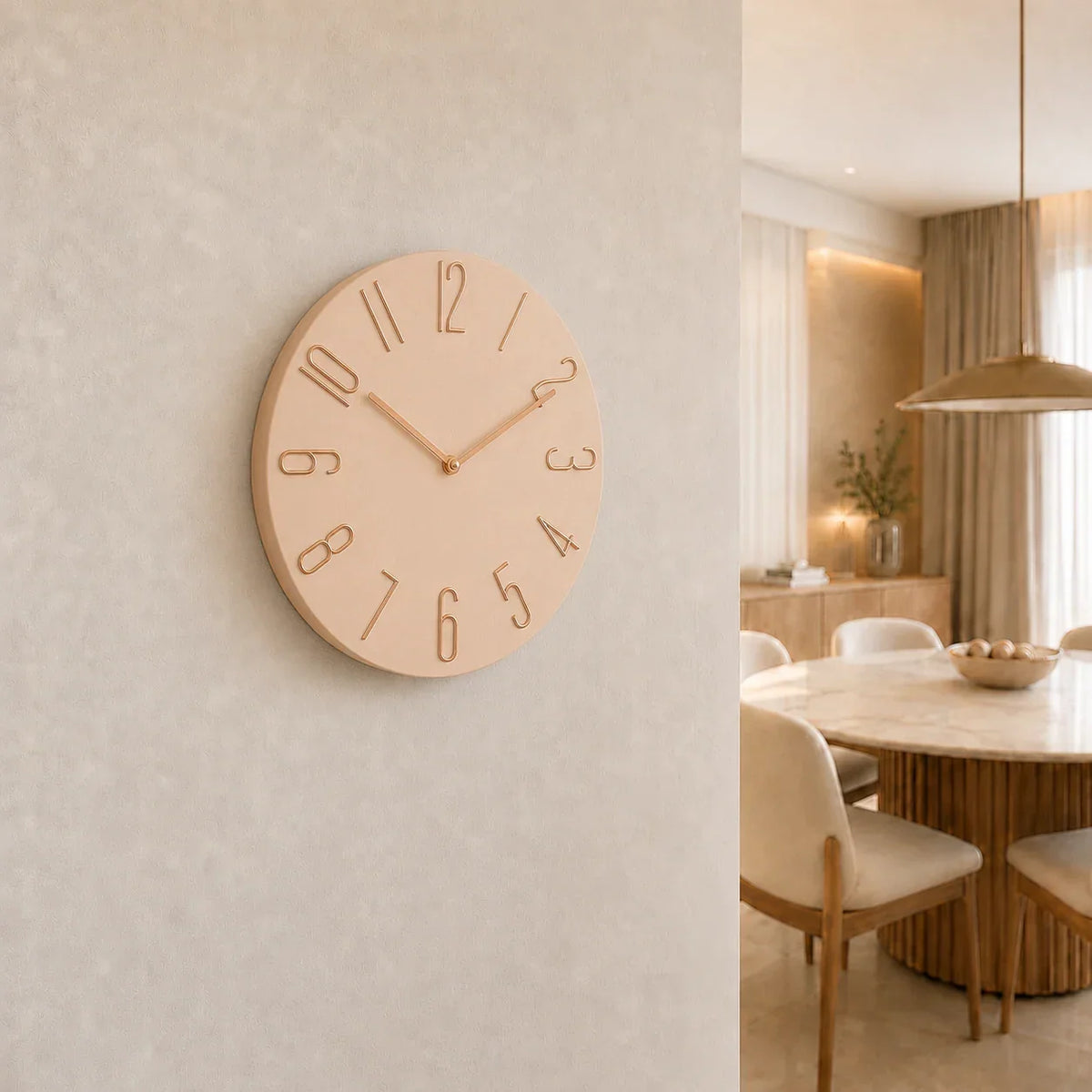 Bellagio Rose 30cm pink wall clock, on a dining room wall