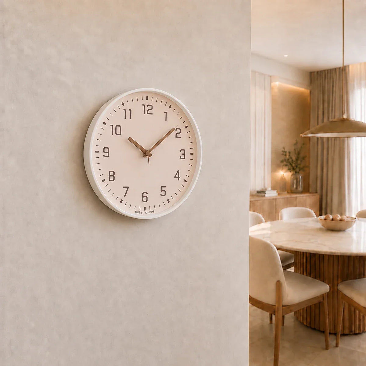 Verona Rose 30cm pink wall clock, on a dining room wall