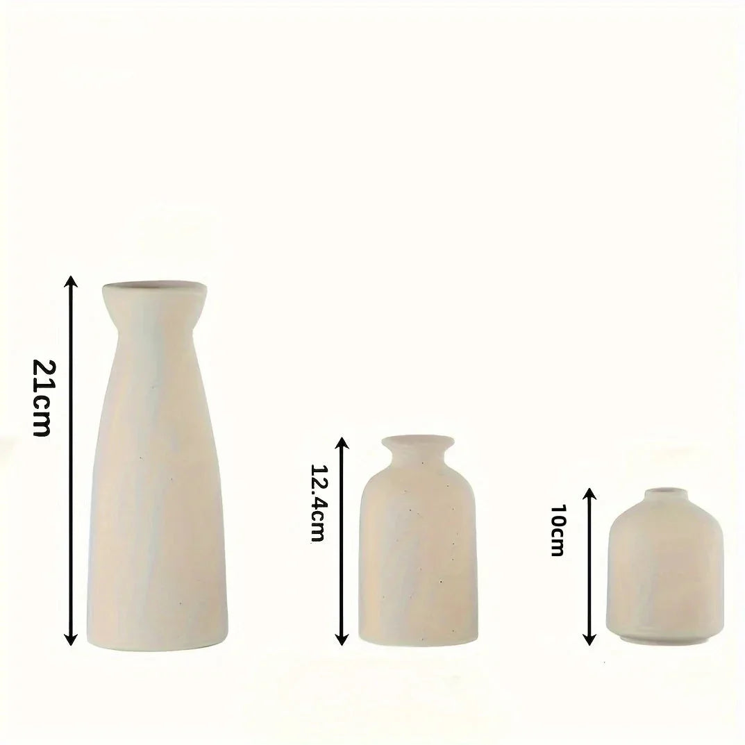 Three cream ceramic vases with size diagrams showing heights of 21 cm, 12.4 cm and 10 cm