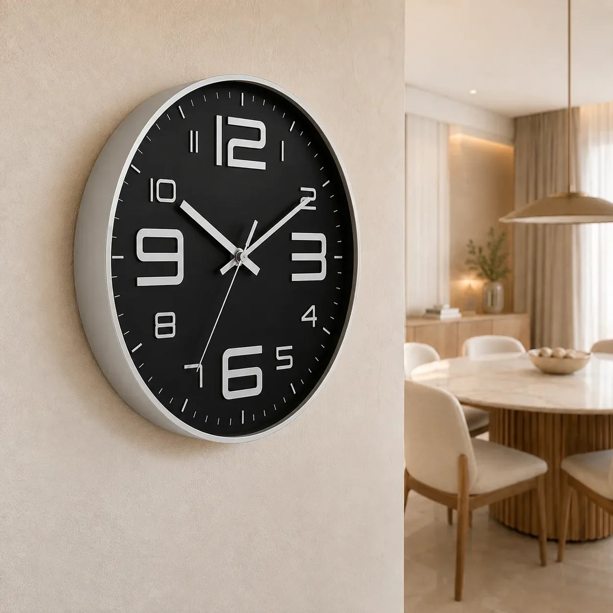 Aurelio Silver & Black 30cm silver wall clock, on a dining room wall