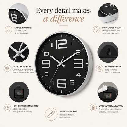 Aurelio Silver & Black 30cm silver wall clock, features graphic: large numerals, silent movement, hanging hole and one AA battery