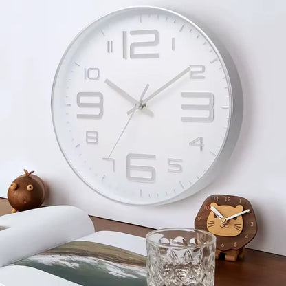 Aurelio Silver & White 30cm silver wall clock, angled view on the wall