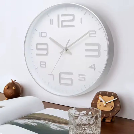Aurelio Silver & White 30cm silver wall clock, angled view on the wall