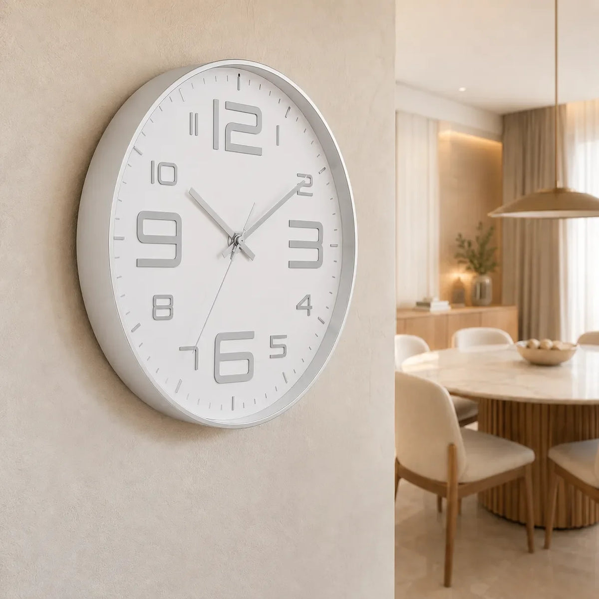 Aurelio Silver & White 30cm silver wall clock, on a dining room wall