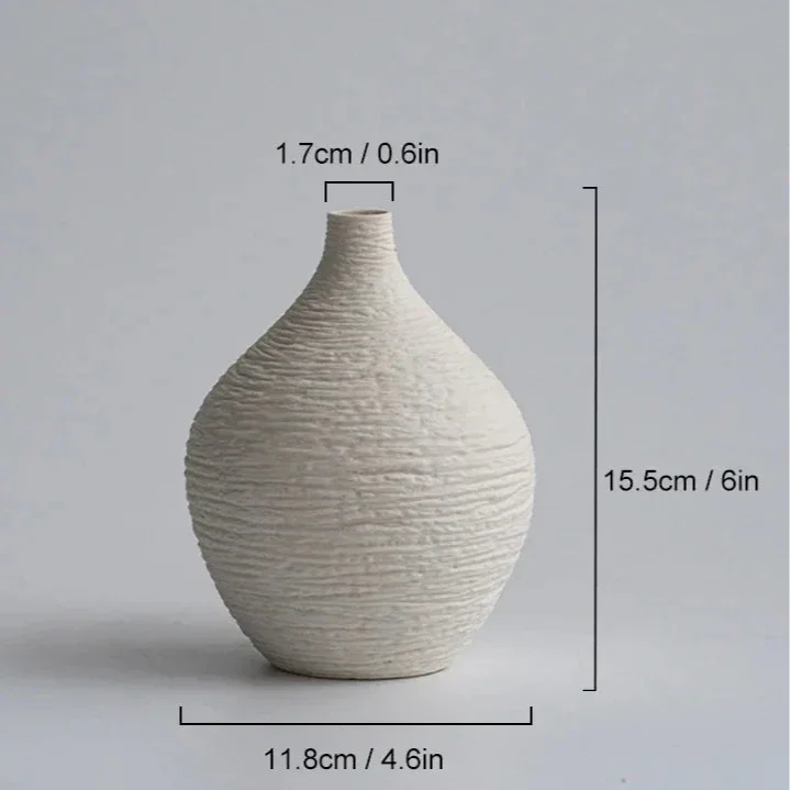 Small white textured ceramic vase diagram showing 15.5 cm height, 11.8 cm width and 1.7 cm opening