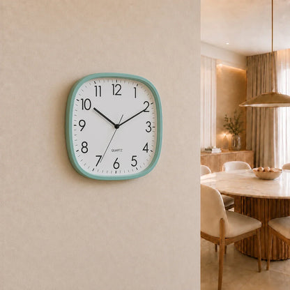 Torino Green 30cm square wall clock, on a dining room wall