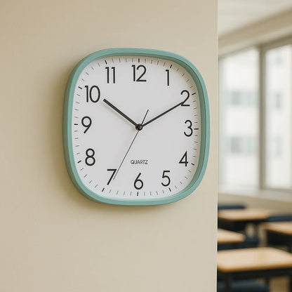 Torino Green 30cm square wall clock, mounted on a plain wall