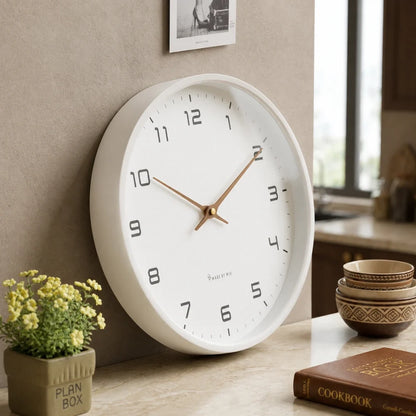 Lorenzzo Snow 25cm white wall clock, angled view on the wall