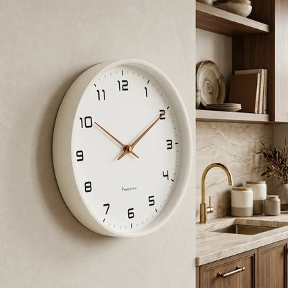 Lorenzzo Snow 25cm white wall clock, angled view on the wall