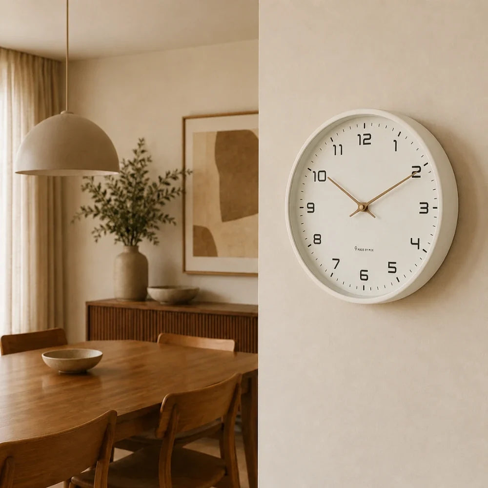 Lorenzzo Snow 25cm white wall clock, on a dining room wall
