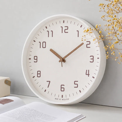 Verona White 30cm white wall clock, angled view on the wall