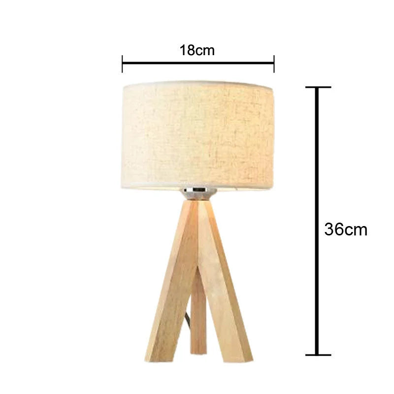 Wooden tripod table lamp diagram showing a height of 36 cm and a cream shade measuring 18 cm across.
