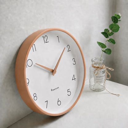 Toscana Beige 26cm wooden wall clock, angled view on the wall
